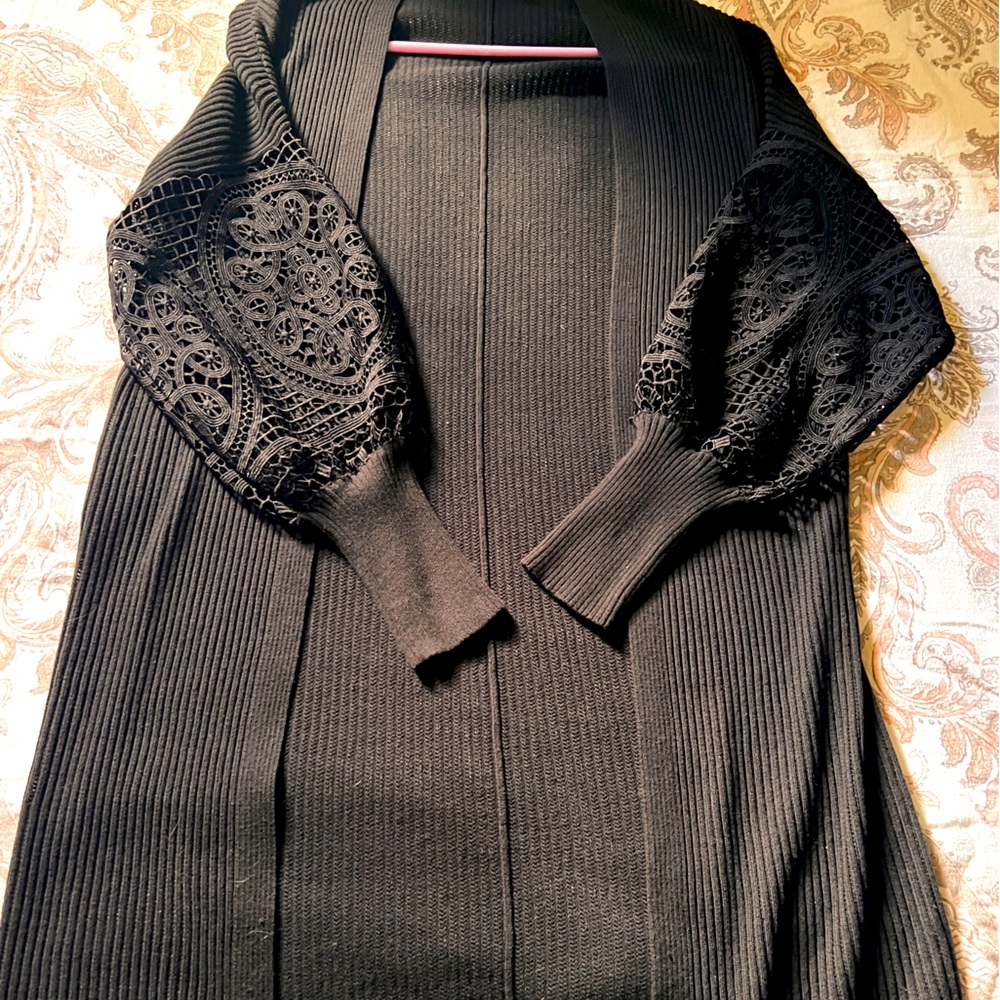 Very sleek and stylish long cardigan. Very beautiful great for special occasions